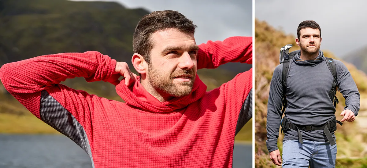 Man wearing warm top hiking with a packpack through Snowdonia